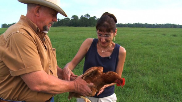 Will Harris hands Audrey Kali a Chicken